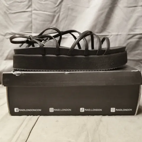 BOXED PAIR OF RAID LONDON PLATFORM STRAPPY SANDALS IN BLACK SIZE UK 9