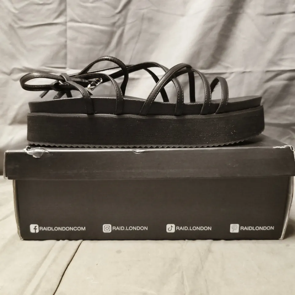 BOXED PAIR OF RAID LONDON PLATFORM STRAPPY SANDALS IN BLACK SIZE UK 9