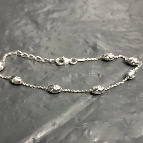 BEAVERBROOKS STERLING SILVER BRACELET WITH RIBBED BEAD SPACERS