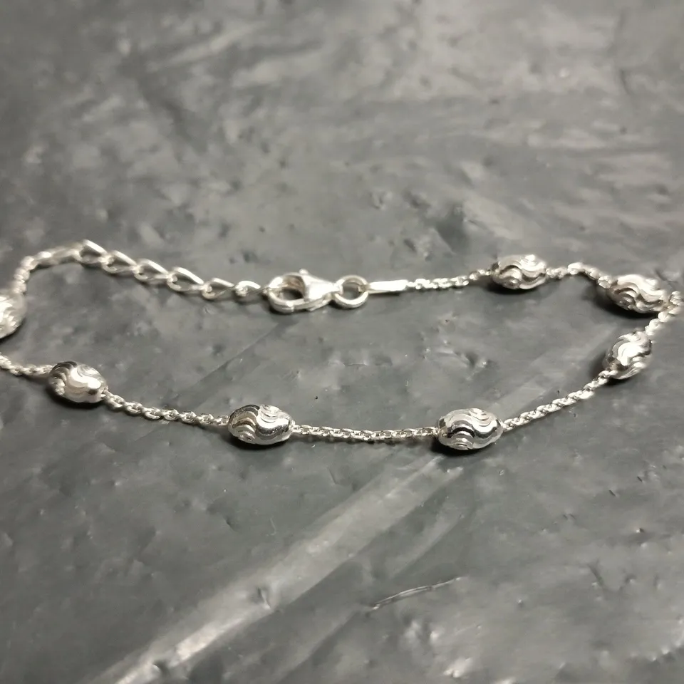 BEAVERBROOKS STERLING SILVER BRACELET WITH RIBBED BEAD SPACERS