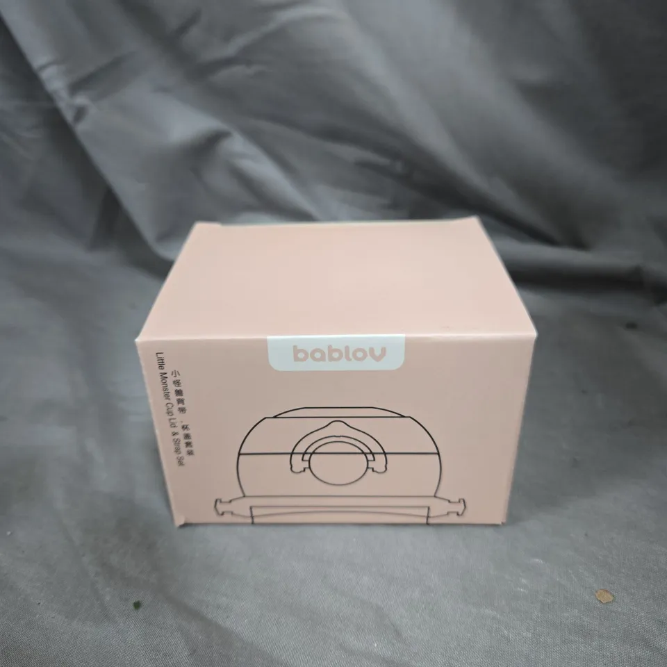 APPROXIMATELY 40 BABLOV LITTLE MONSTER CUP LID & STRAP SETS 