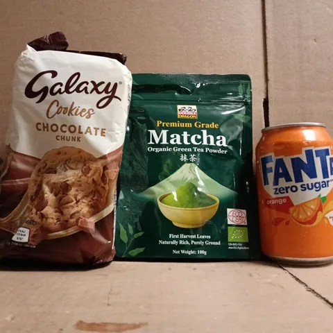 APPROXIMATELY 10 ASSORTED FOOD AND DRINK ITEMS TO INCLUDE FANTA, GALAXY COOKIES, MATCHA, ETC