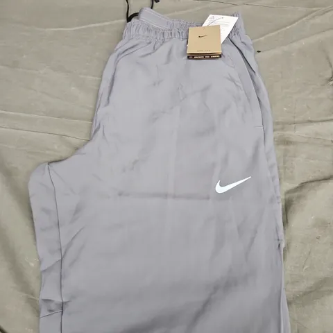 NIKE LOGO TRACKSUIT BOTTOMS - SIZE LARGE