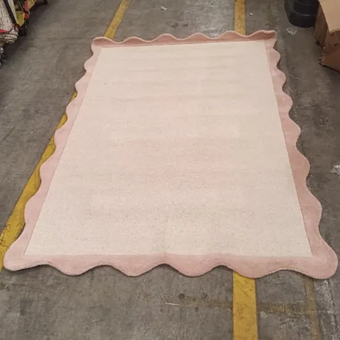 PINK SCALLOPED-EDGE RUG  APPROXIMATELY 230 CM X 160 CM