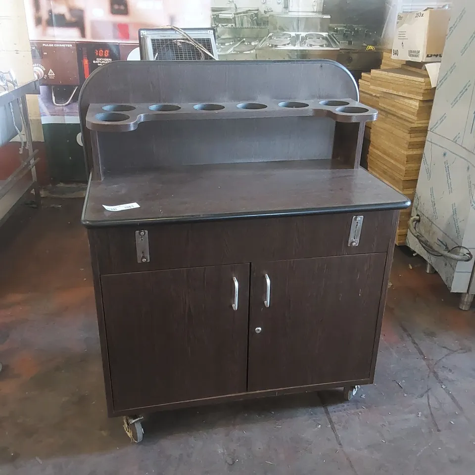 HOSPITALITY CUTLERY AND CONDIMENT UNIT ON WHEELS 