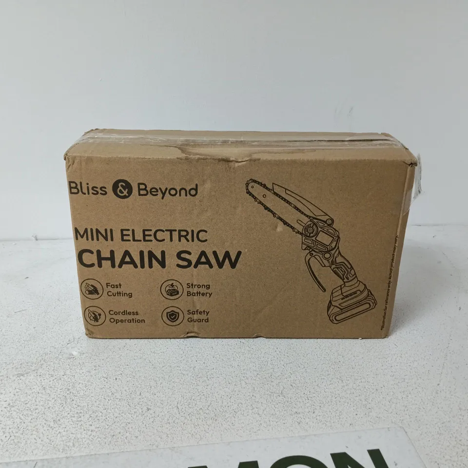 BLISS AND BEYOND MINI ELECTRIC CHAIN SAW IN CASE