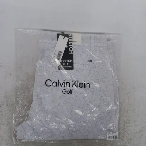 bagged calvin klein golf shorts in white size 38