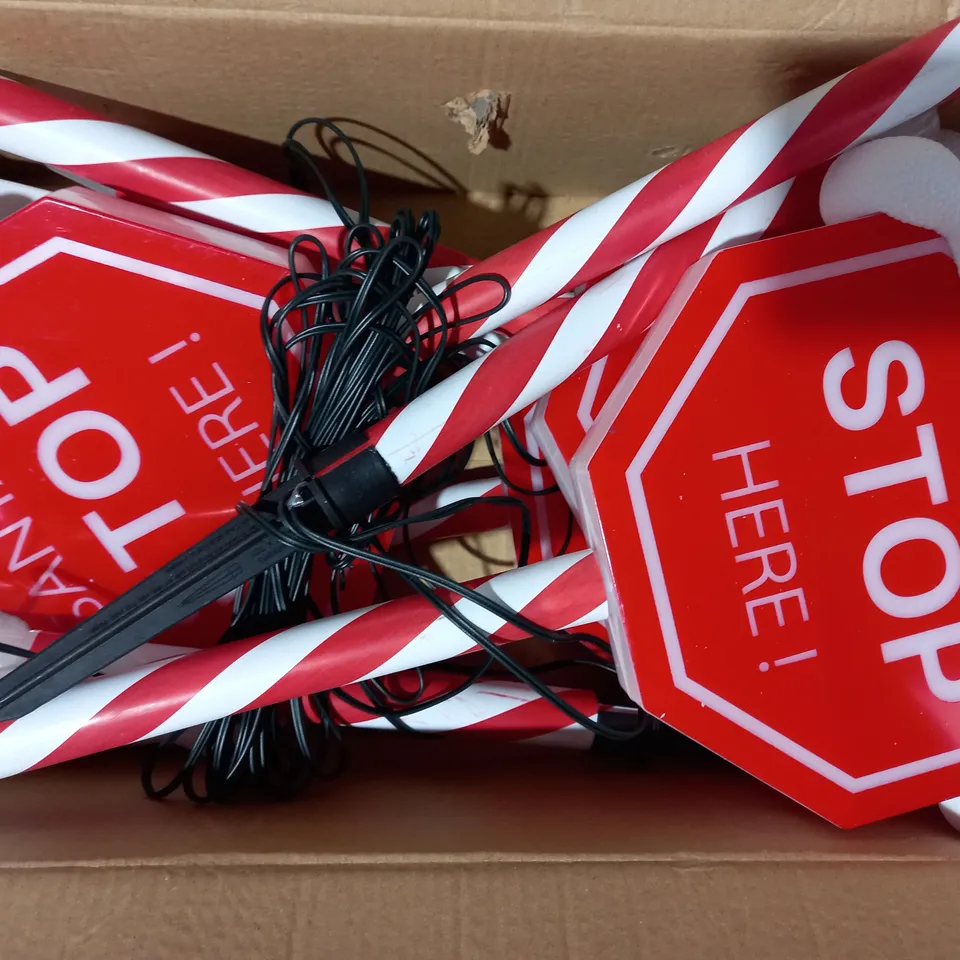 BOXED FESTIVE SET OF PRELIT SANTA STOP HERE STAKES