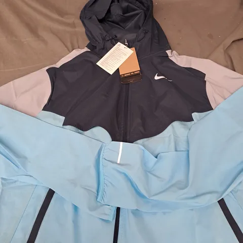 NIKE RUNNING JACKET IN BLUE - M