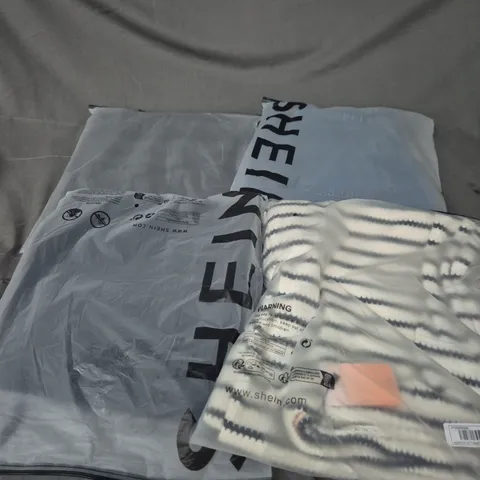APPROXIMATELY 25 ASSORTED CLOTHING AND FASHION PRODUCTS IN VARIOUS STYLES AND SIZES - COLLECTION ONLY
