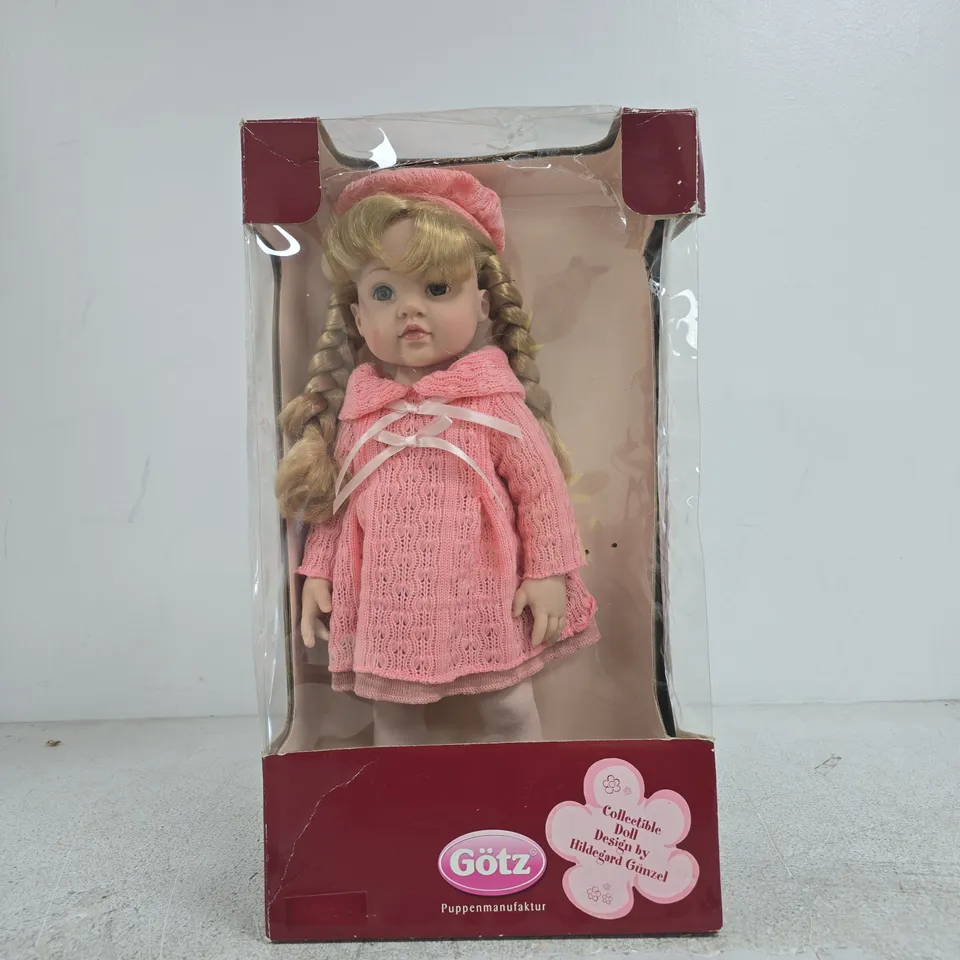 GÖTZ COLLECTIBLE DOLL IN PINK KNIT DRESS