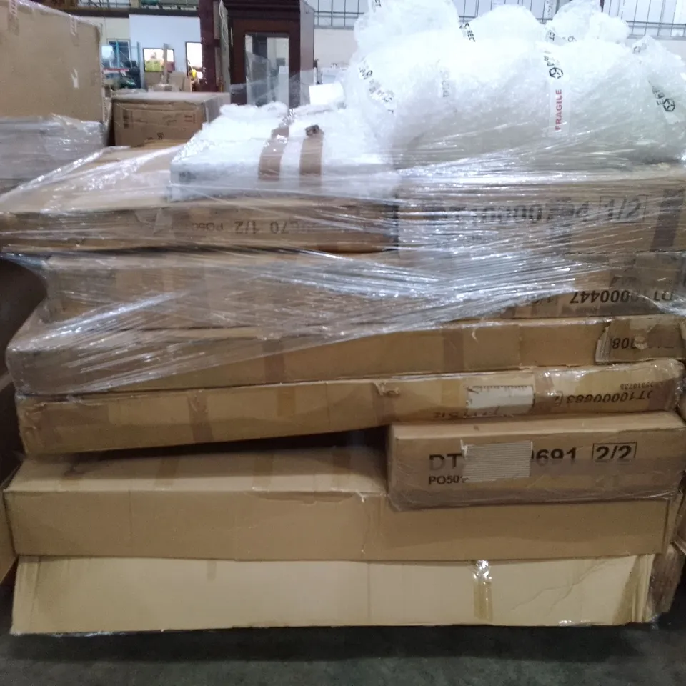 PALLET OF ASSORTED FLAT PACK DINING TABLE PARTS 