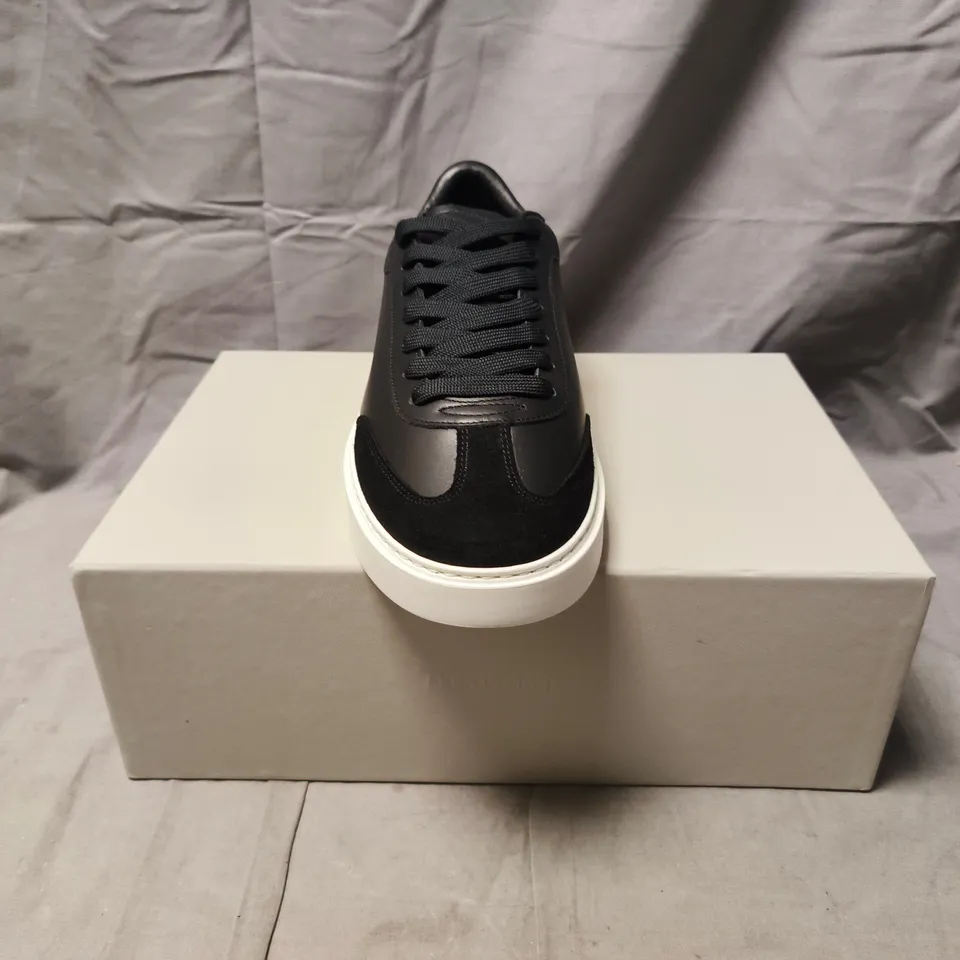 BOXED PAIR OF ARNE TENNIS TRAINERS IN BLACK SIZE UK 10