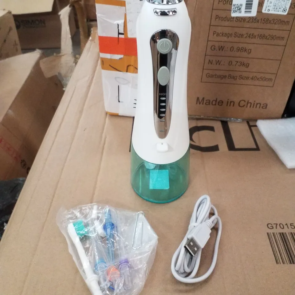 BOXED PORTABLE ORAL IRRIGATOR
