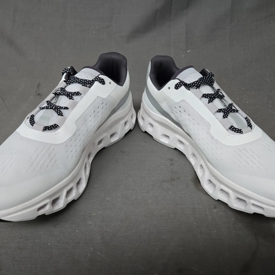 BOXED PAIR OF ON CLOUDMONSTER SHOES IN WHITE UK SIZE 7.5