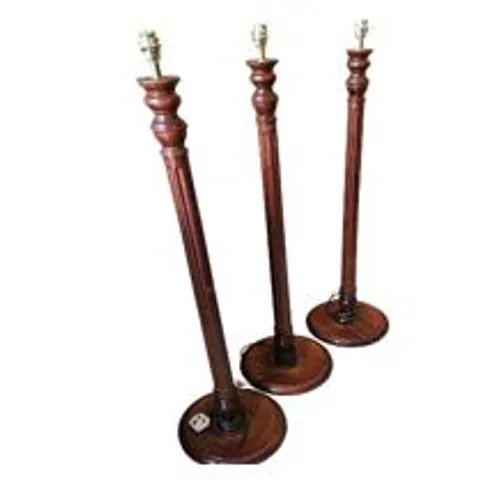 THREE MAHOGANY TALL LAMP STANDS