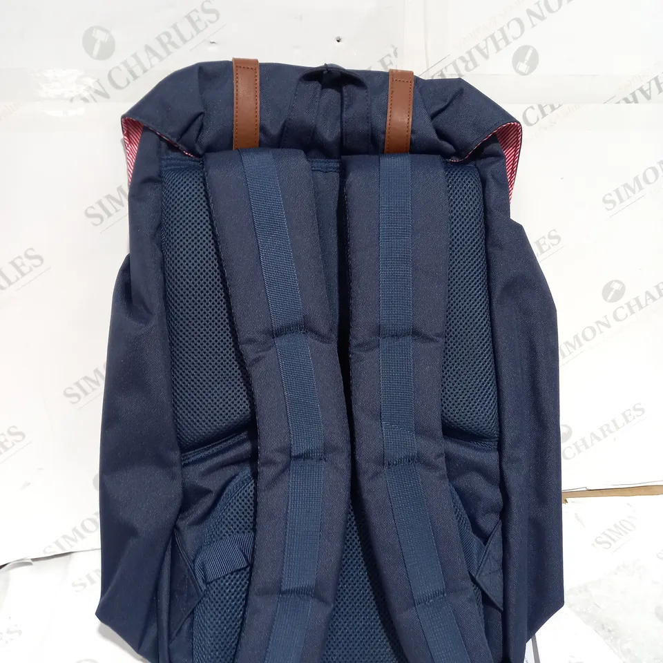 NAVY HERSCHEL RETREAT BACKPACK WITH BROWN STRAPS AND FOLD OVER TOP