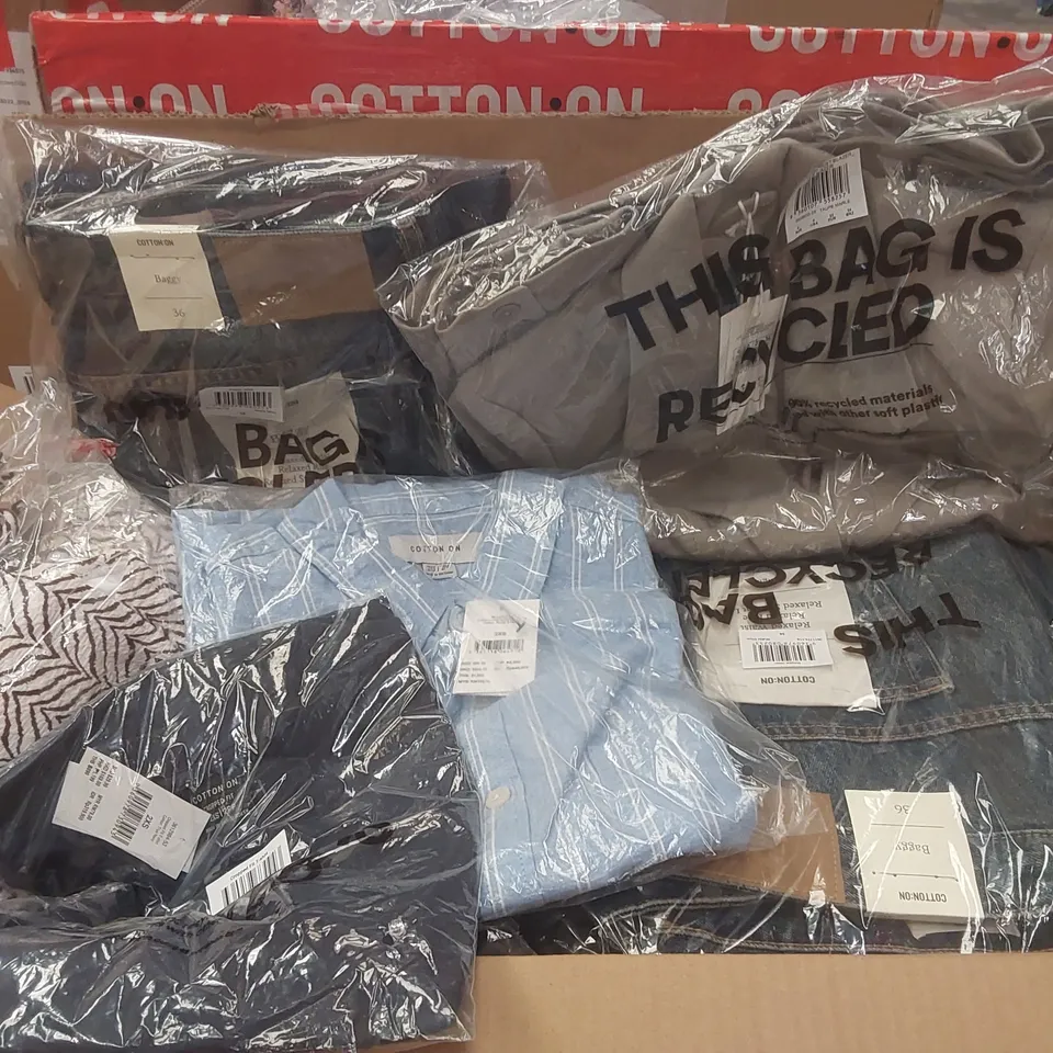 PALLET CONTAINING A VERY LARGE QUANTITY OF BRAND NEW ASSORTED CLOTHING INCLUDING: BIKINIS, JEANS, JUMPERS, BLAZER, SHIRTS, HELLO KITTY HATS ECT AND STORAGE BOX