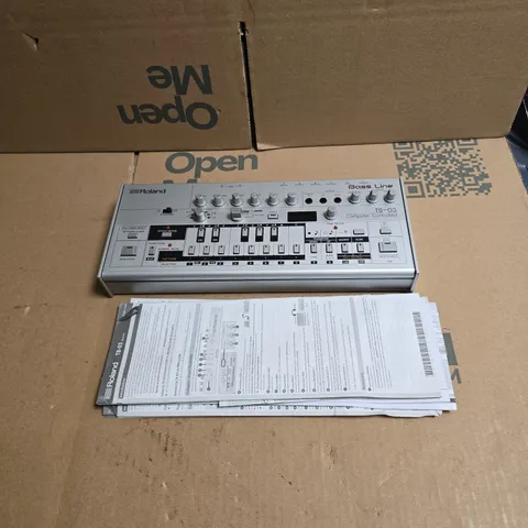 ROLAND TB-03 BASS LINE COMPUTER CONTROLLED SYNTHESIZER IN GREY BAG WITH STRAP AND INSTRUCTIONS
