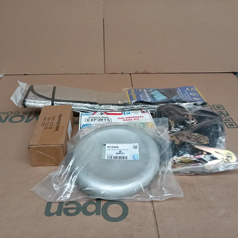 BOX OF APPROXIMATELY 20 ASSORTED AUTO RELATED ITEMS TO INCLUDE GOODYEAR FOLDING SUN REFLECTOR, THEORY TEST EXPERT PASS KIT, FRONT WHEEL CENTRE CAP TRIM ETC