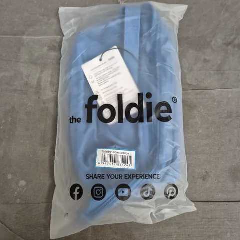 BAGGED THE FOLDIE TOILETRY BAG IN COASTAL BLUE