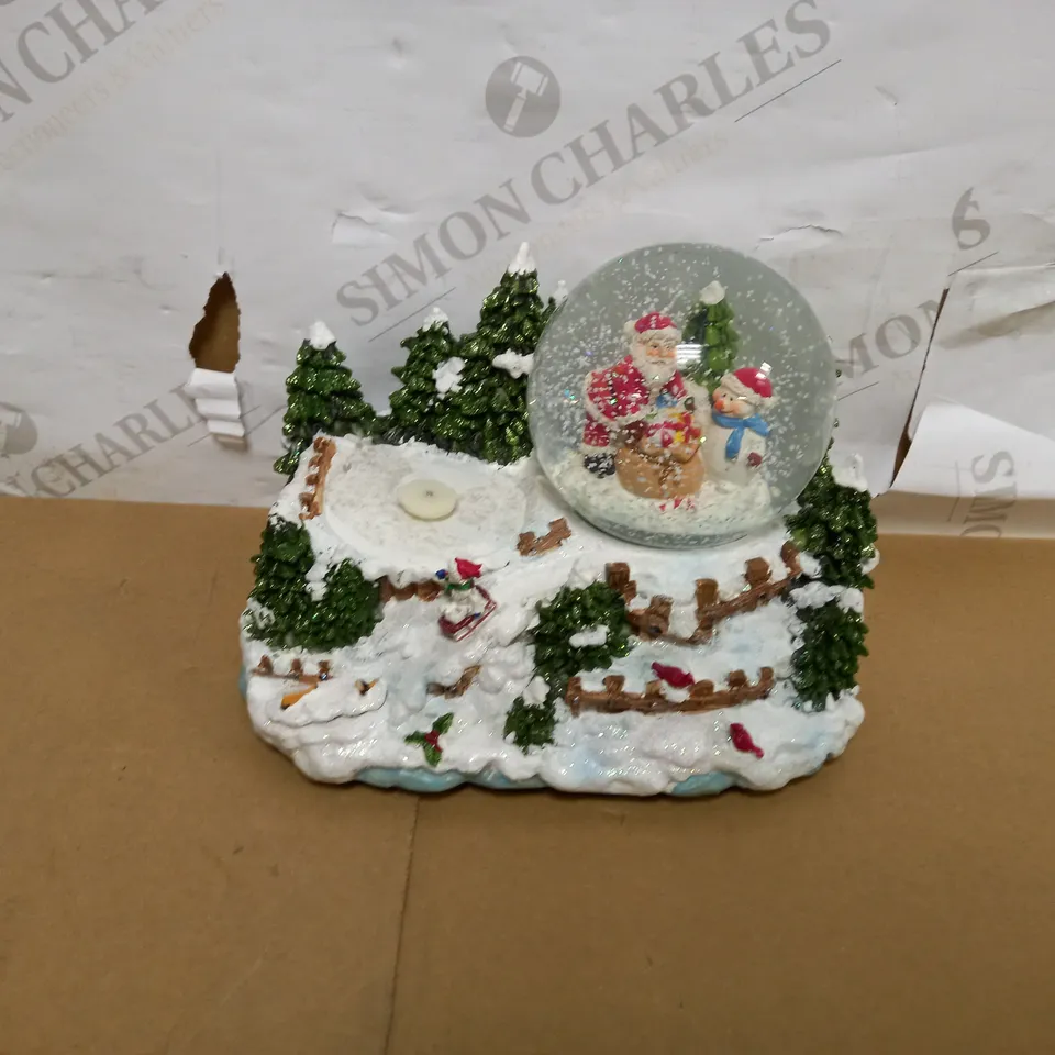 WERCHRISTMAS SNOW GLOBE AND FEATURE