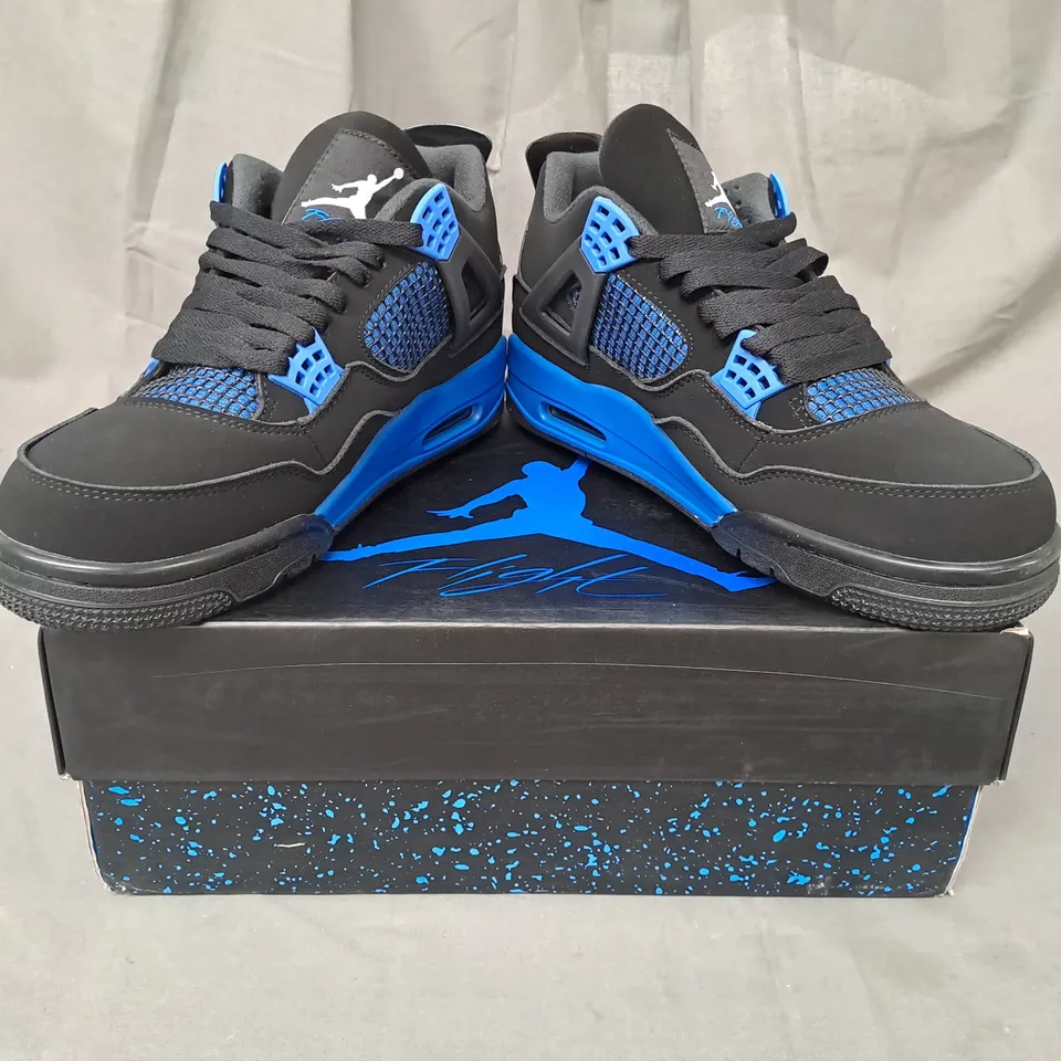 BOXED PAIR OF NIKE AIR JORDAN 4 RETRO SHOES IN BLACK/BLUE UK SIZE 8.5