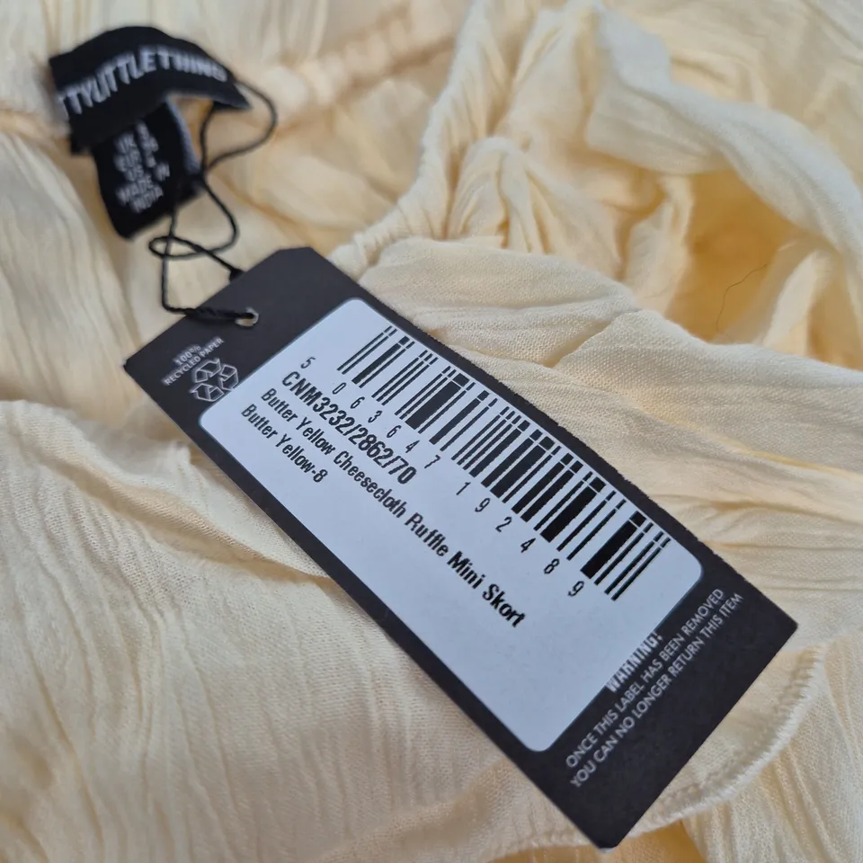 PRETTYLITTLETHING BUTTER YELLOW CHEESECLOTH RUFFLE MINI SKORT – UK 8 (EU 36)