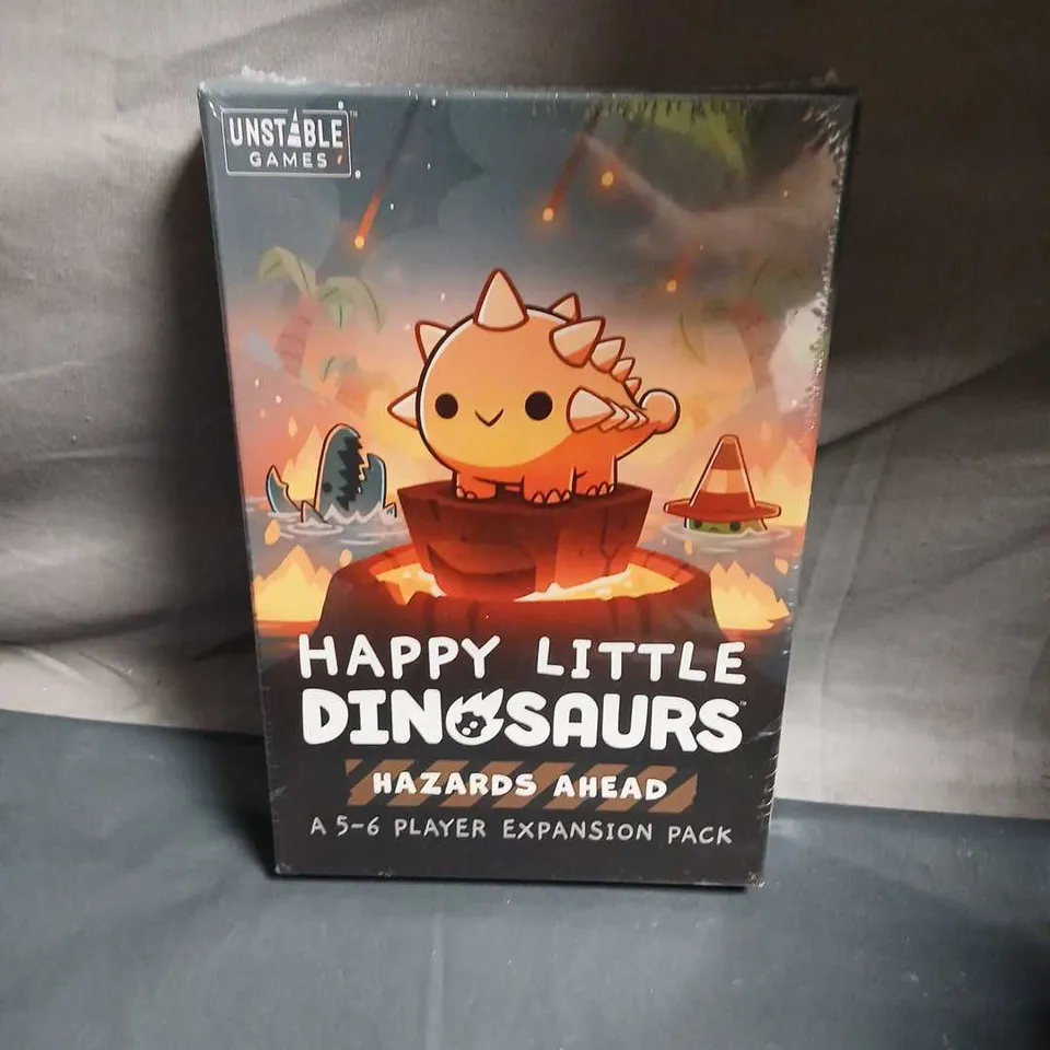 HAPPY LITTLE DINOSAURS: HAZARDS AHEAD EXPANSION PACK (5–6 PLAYERS) – UNSTABLE GAMES