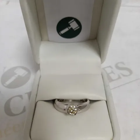 DESIGNER 18CT WHITE GOLD SOLITAIRE RING SET WITH AN OLD CUT DIAMOND WEIGHING +-0.52CT