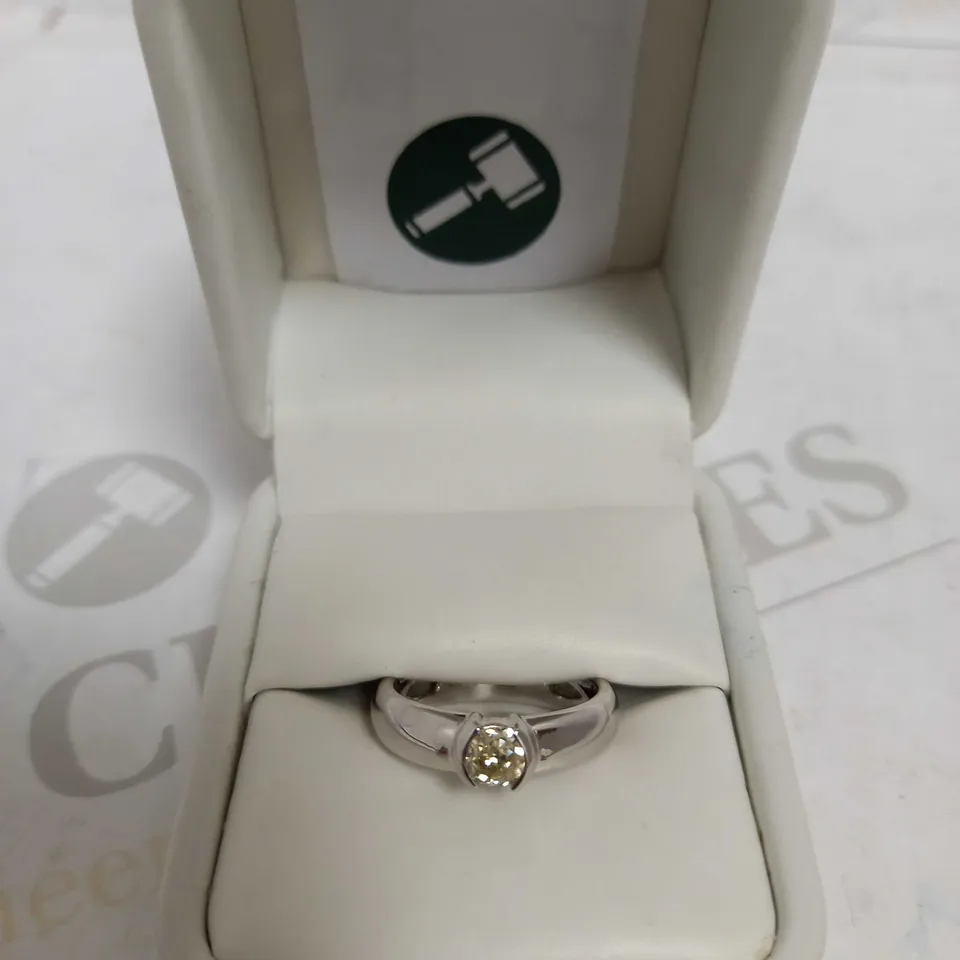 DESIGNER 18CT WHITE GOLD SOLITAIRE RING SET WITH AN OLD CUT DIAMOND WEIGHING +-0.52CT