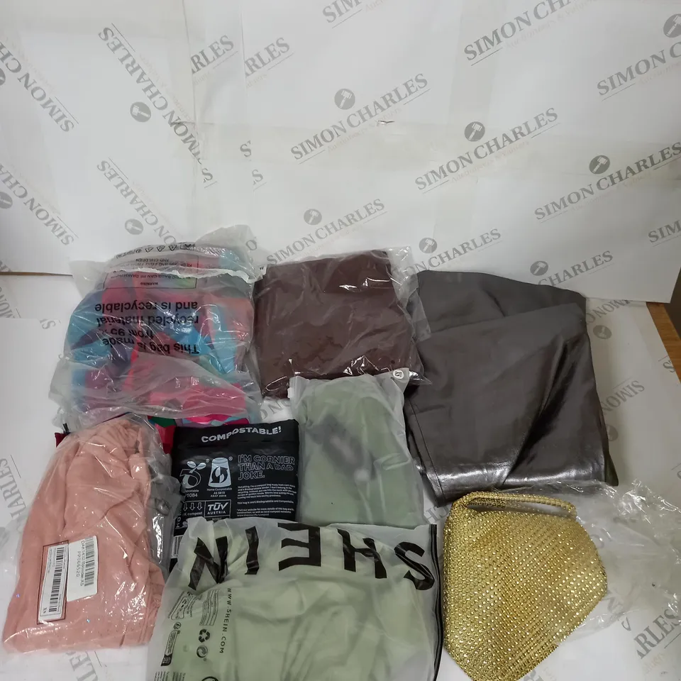 LARGE BOX OF ASSORTED CLOTHING ITEMS IN VARIOUS COLOURS AND SIZES INCLUDING TROUSERS , TOPS AND JUMPERS 