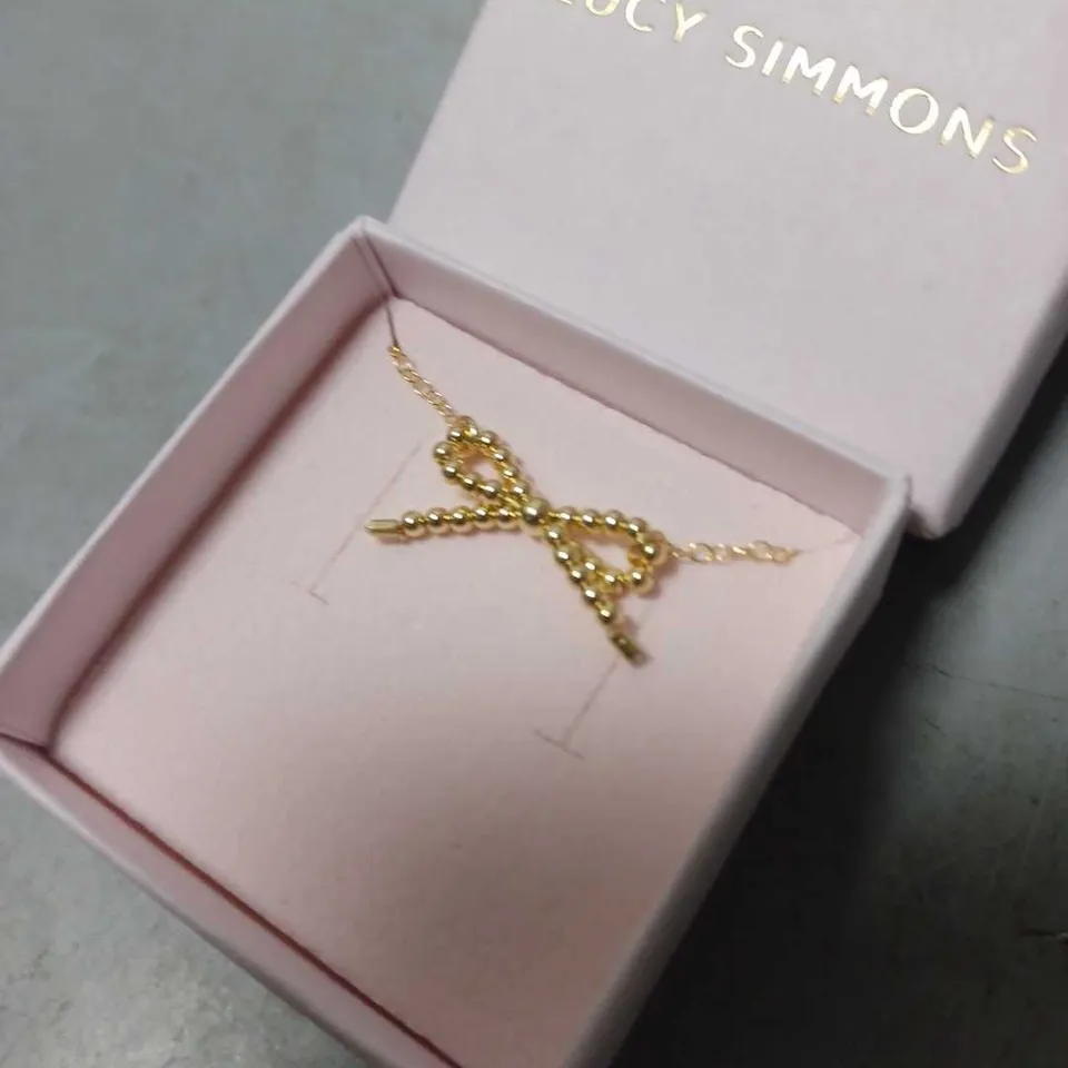 BOXED LUCY SIMMONS GOLD BEAD BOW NECKLACE 