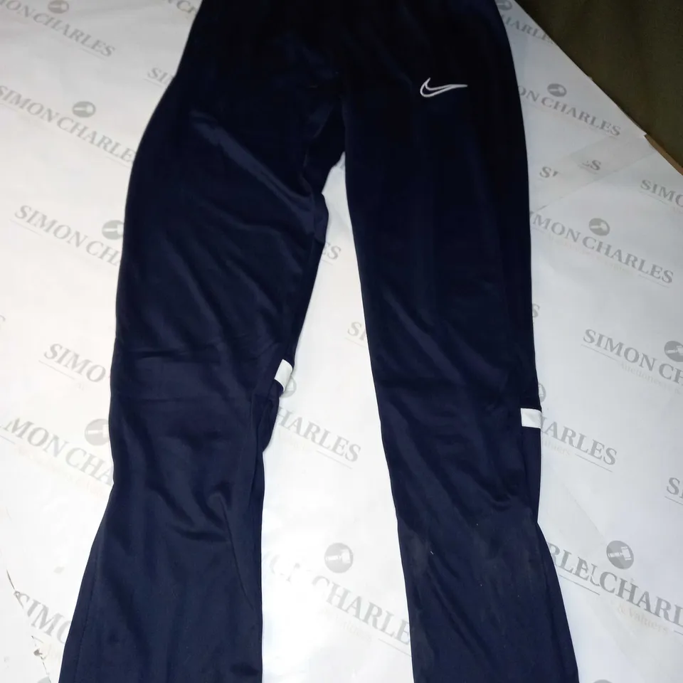 NIKE ACADEMY PANTS IN NAVY - SIZE 10