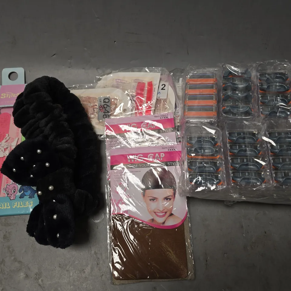 APPROXIMATEY 15 HEALTH AND BEAUTY PRODUCTS TO INCLUDE RAZOR BLADES, WIG CAPS, AND NAIL FILES ETC. - COLLECTION ONLY