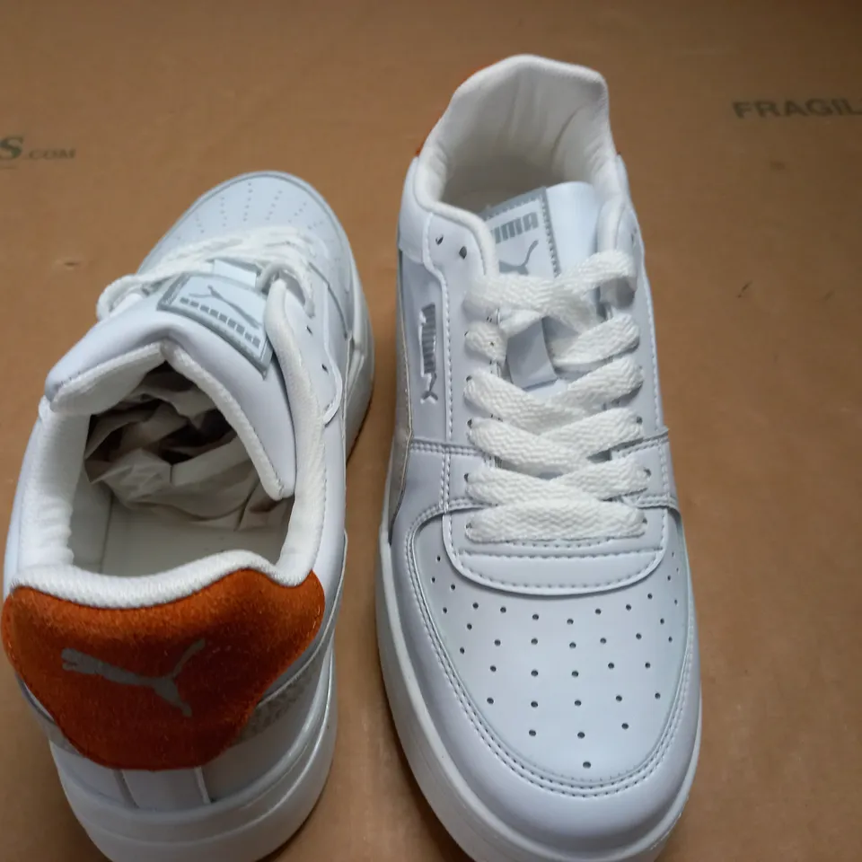 PAIR OF PUMA WHITE TRAINERS - UK 7