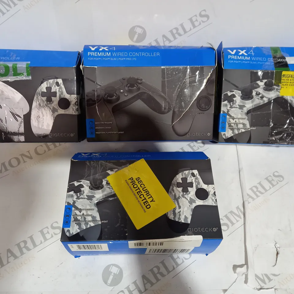 4 VXA PLAYSTATION CONTROLLERS INCLUDING CAMO AND BLACK