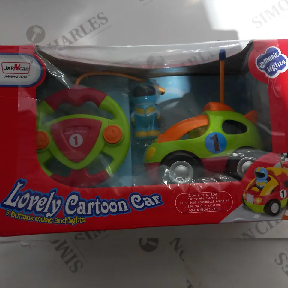 BOXED JAKMEAN LOVELY CARTOON CAR , WITH MUSIC AND LIGHTS 