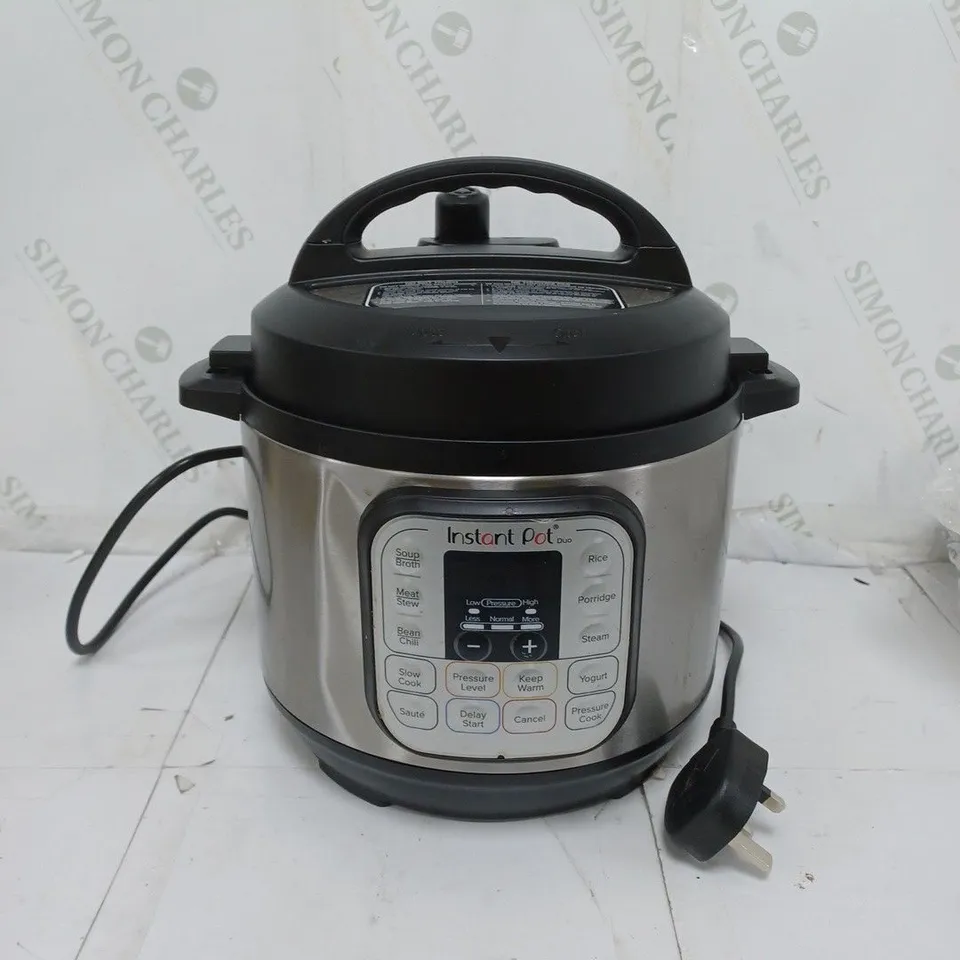 BOXED INSTANT POT 7-IN-1 PRESSURE COOKER