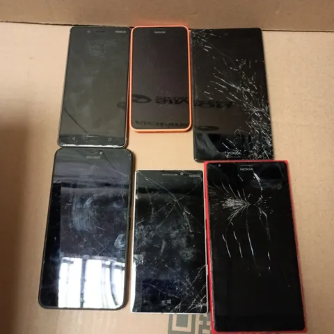 APPROXIMATELY 9 ASSORTED USED PHONES AND PHONE PARTS TO INCLUDE NOKIA & MICROSOFT