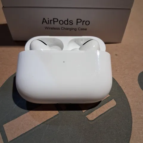 BOXED APPLE AIR POD PRO IN EAR HEADPHONES WITH WIRELESS CHARGING CASE