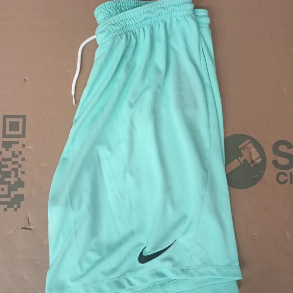 NIKE SLIM FIT SHORTS IN MINT SIZE LARGE