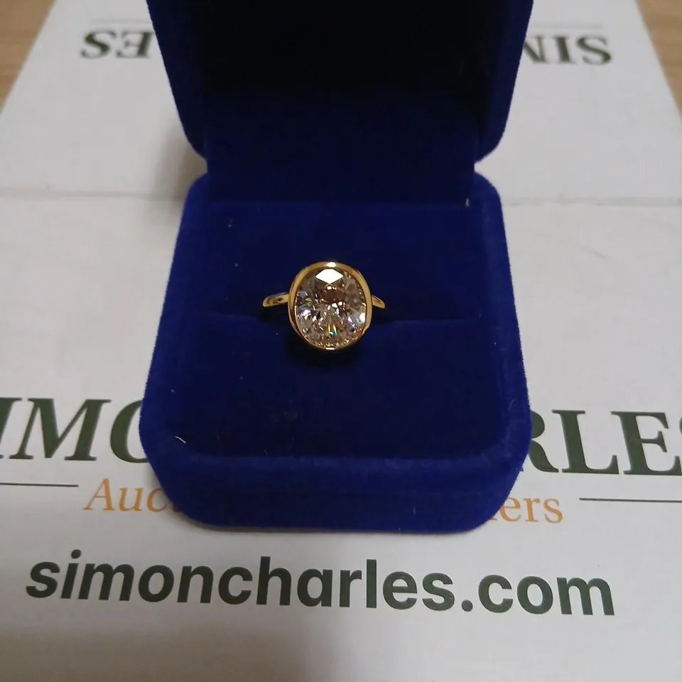 DIAMONIQUE 4CT TW OVAL CUT BEZEL SET RING STERLING SILVER 