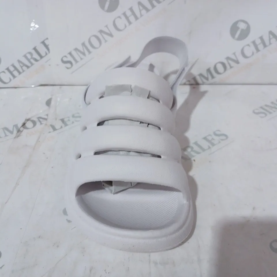 BOXED PAIR OF UGG OPEN TOE SANDALS IN WHITE SIZE 3