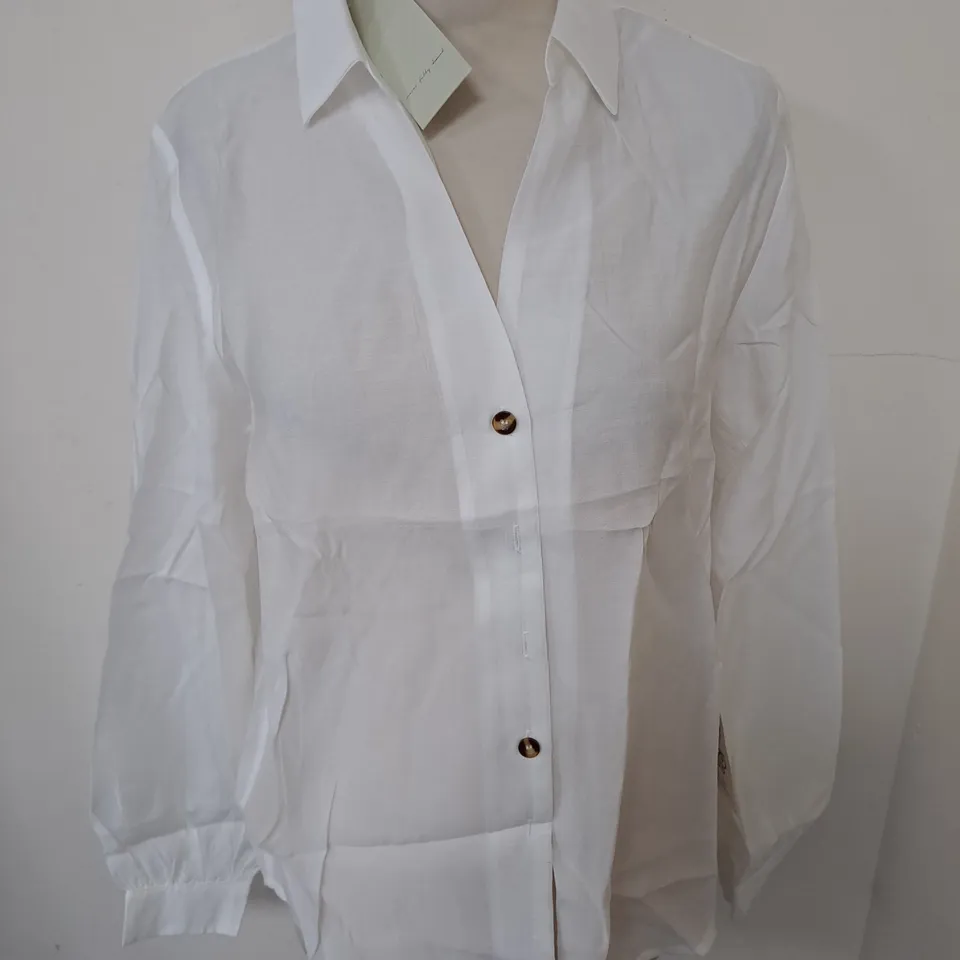 NEVER FULLY DRESSED WHITE MILEY T-SHIRT - UK 8