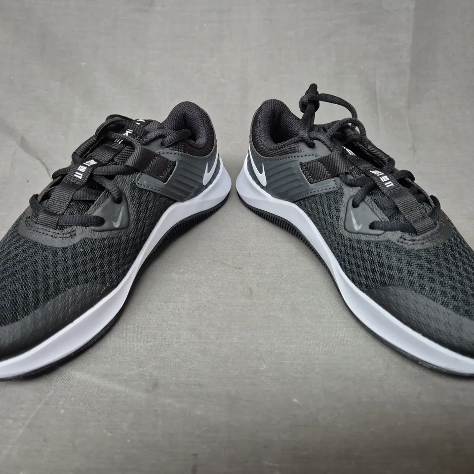 BRAND NEW BOXED PAIR OF NIKE MC TRAINERS IN BLACK/WHITE UK SIZE 3