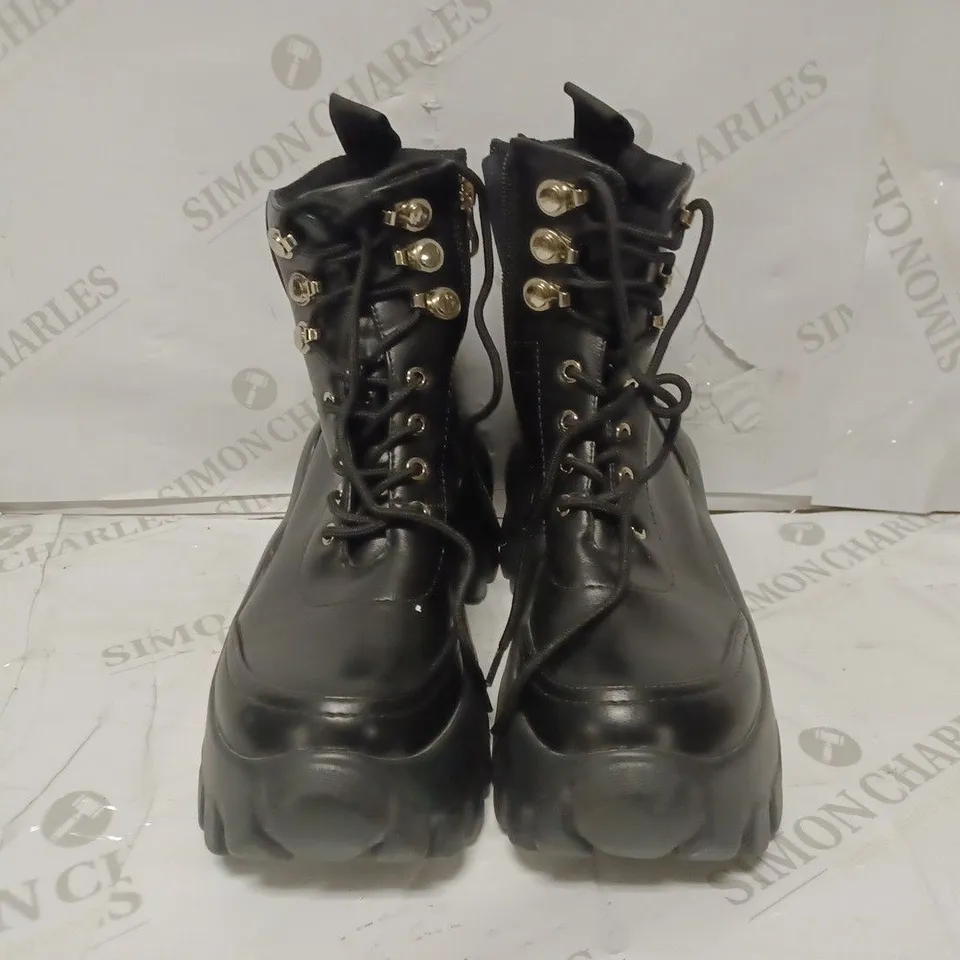 PAIR OF KOI DESIGNER VEGAN CHUNKY ZIP UP ANKLE BOOTS IN BLACK - SIZE 9