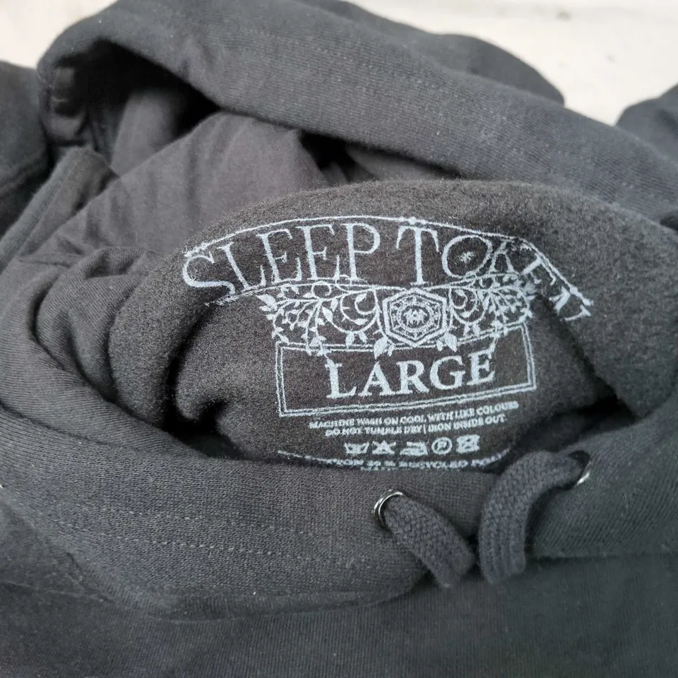 BLACK HOODIE WITH CHEST CREST GRAPHIC AND SLEEVE LOGOS – SIZE LARGE 