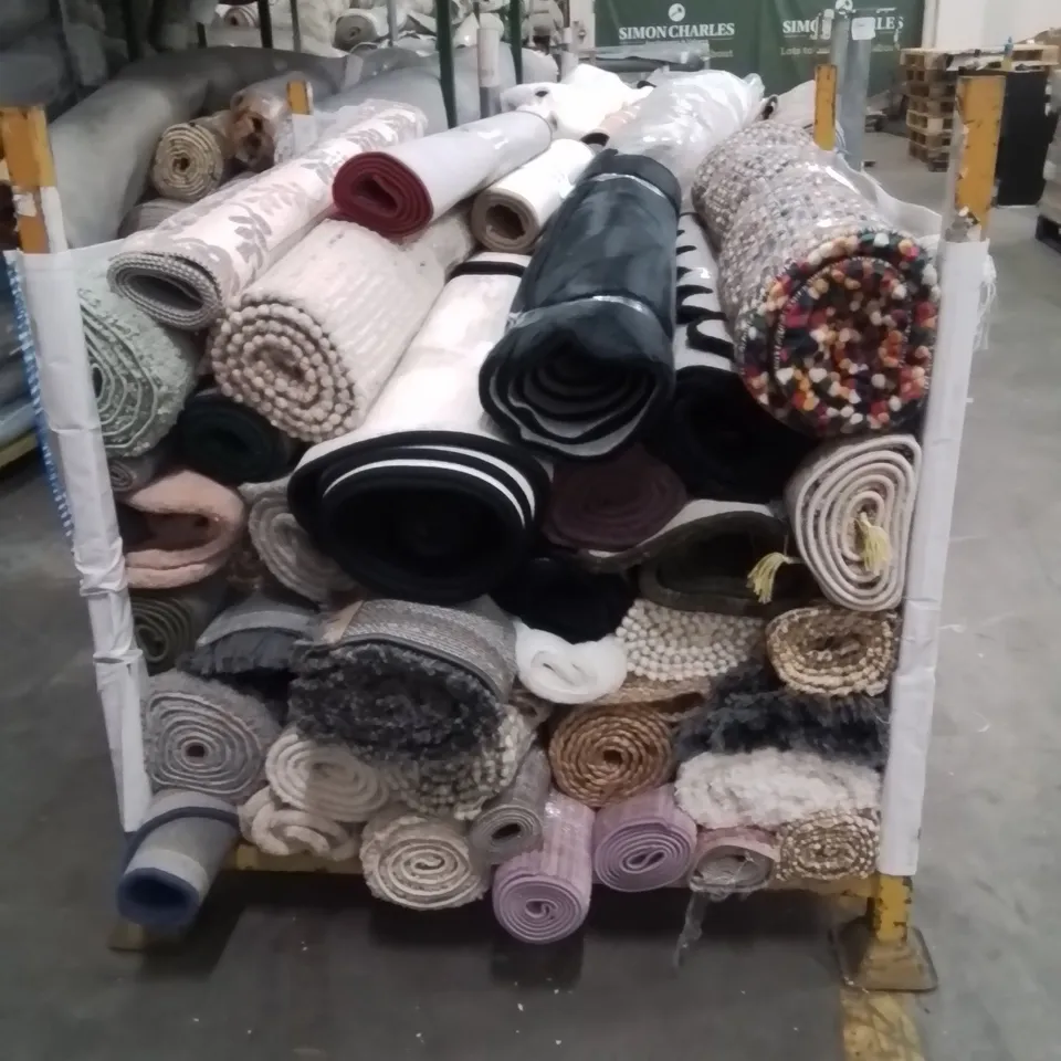 STILLAGE OF APPROXIMATELY 30 QUALITY DESIGNER RUGS