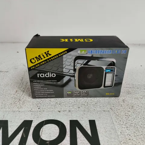 CMIK FM/AM RADIO WITH LIGHT AND HANDLE BOXED